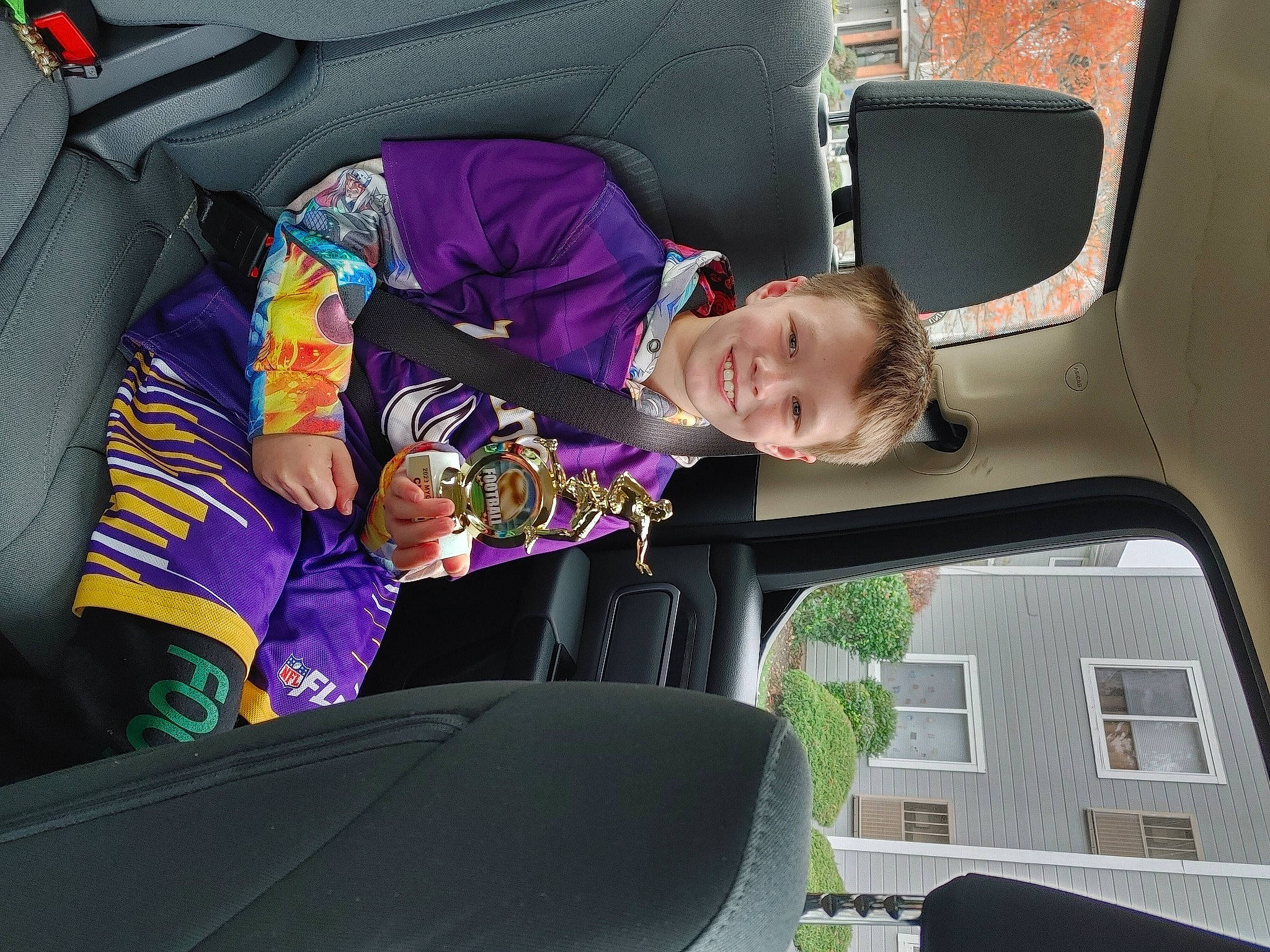 Kaleb is registered to the contest to win money with this photo: auto_part, automotive_design, automotive_exterior, automotive_window_part, car, car_seat, car_seat_cover, family_car, fun, head_restraint, joy, luxury_vehicle, mode_of_transport, motor_vehicle, person, smile, steering_wheel, toddler, vehicle, vehicle_door