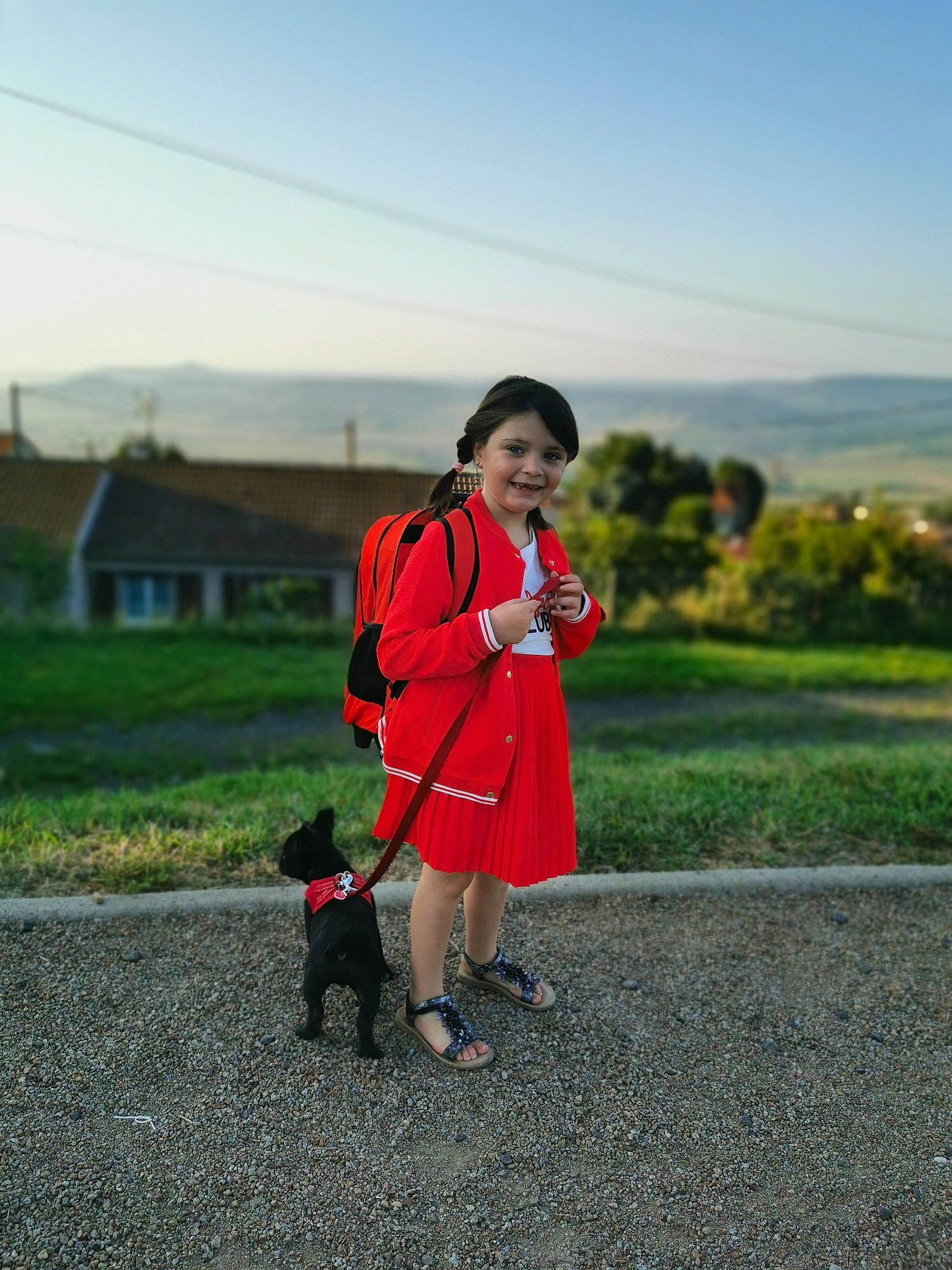 Emma participe au concours pour gagner de l'argent avec cette photo : asphalt, boot, carnivore, companion_dog, dog, dog_breed, dog_supply, electric_blue, grass, grassland, human_body, joy, landscape, leisure, people_in_nature, person, pet_supply, plant, recreation, sky