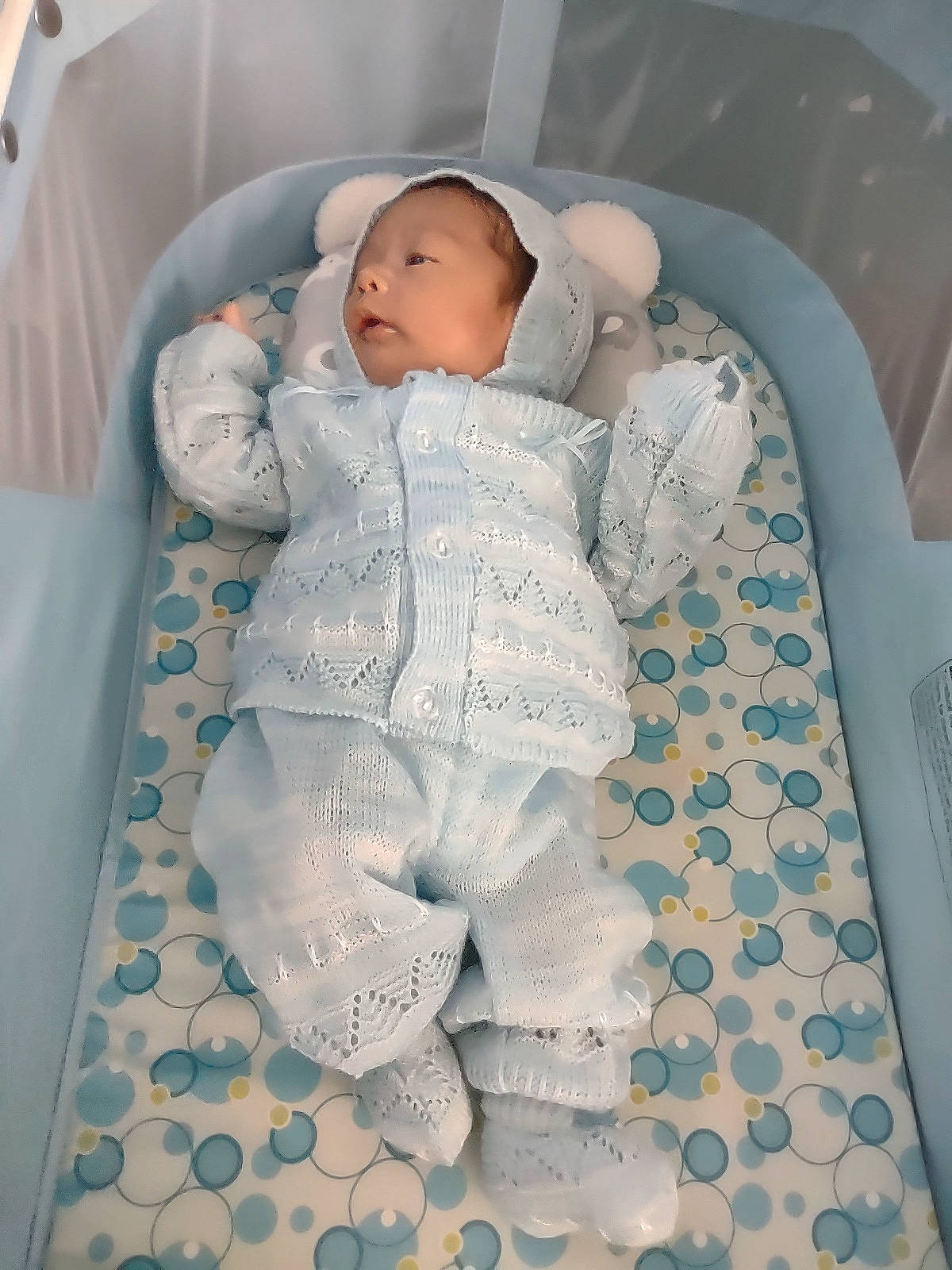Martin is registered to the contest to win money with this photo: azure, baby, baby_safety, baby_sleeping, baby_toddler_clothing, bed, cheek, comfort, cradle, eye, face, head, human_body, infant_bed, linens, pattern, person, product, sleeve, textile