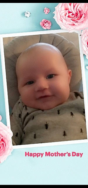 Bo is registered to the contest to win money with this photo: baby, baby_toddler_clothing, cheek, child, chin, eyebrow, eyelash, face, facial_expression, head, iris, mouth, nose, person, photograph, pink, rose, skin, sleeve, smile