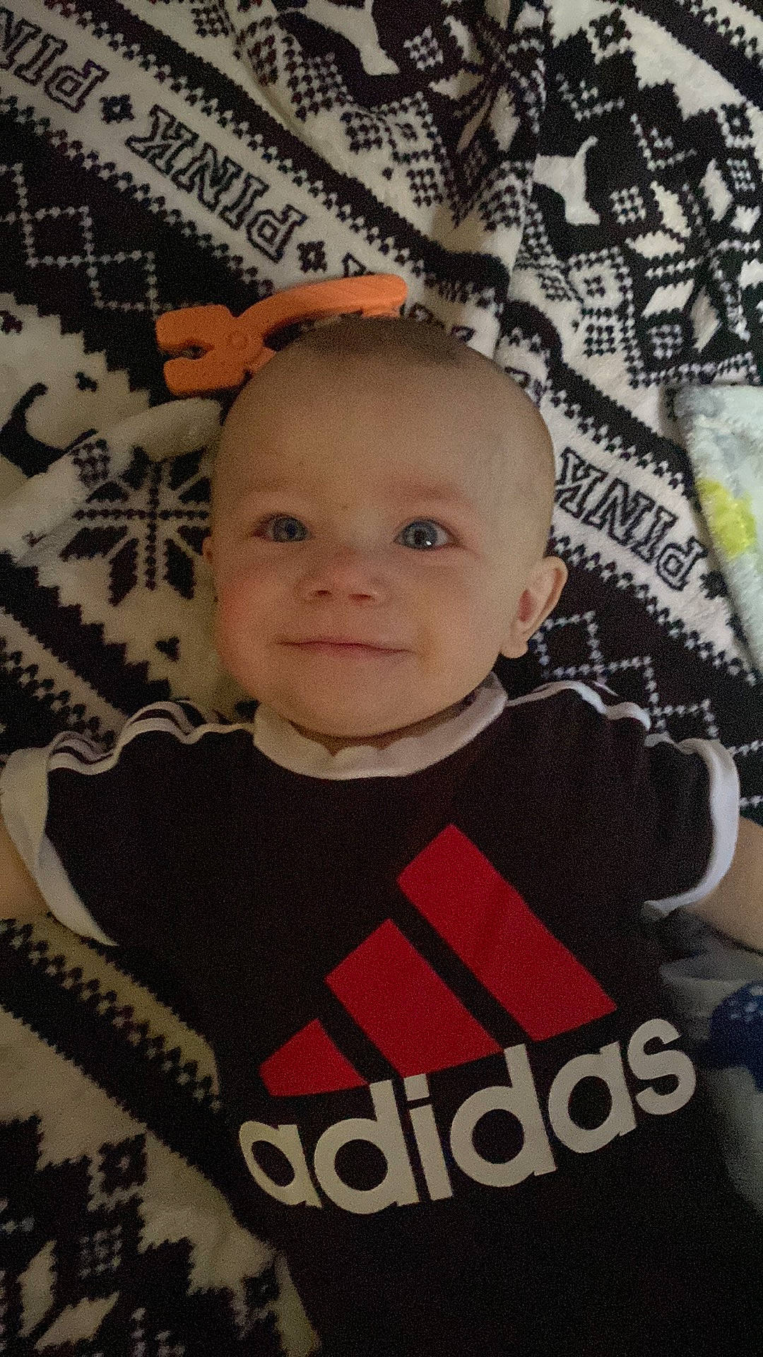 Scotty is registered to the contest to win money with this photo: baby, baby_toddler_clothing, cheek, child, chin, cool, eyebrow, facial_expression, font, fun, hairstyle, happy, pattern, person, photo_caption, publication, room, sleeve, smile, t_shirt