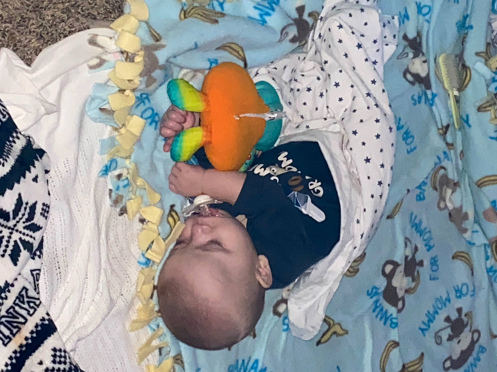 Scotty is registered to the contest to win money with this photo: art, baby, baby_products, baby_toddler_clothing, child, comfort, fun, happy, linens, pattern, person, product, room, t_shirt, toddler, visual_arts