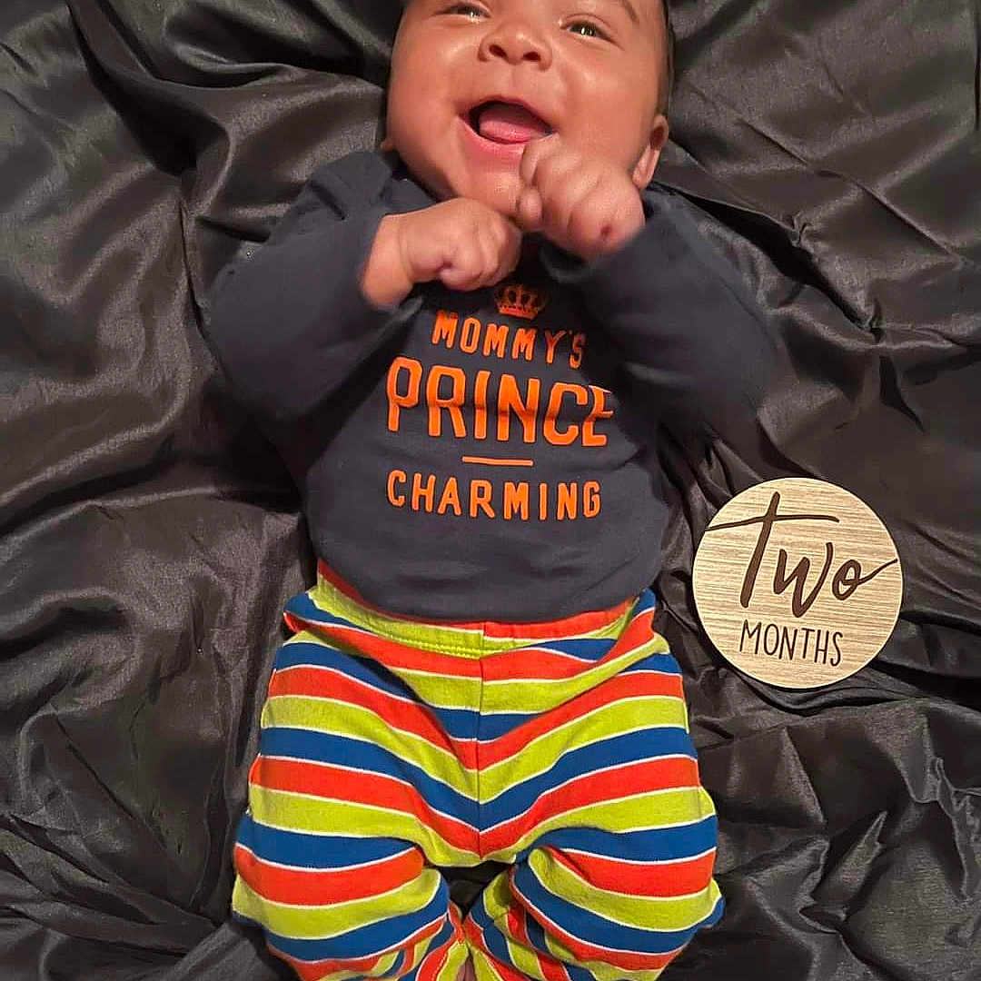 Amari is registered to the contest to win money with this photo: baby, babylaughing, clothing, crying, face, happy, head, pajamas, person, photography, portrait, sad, yawning