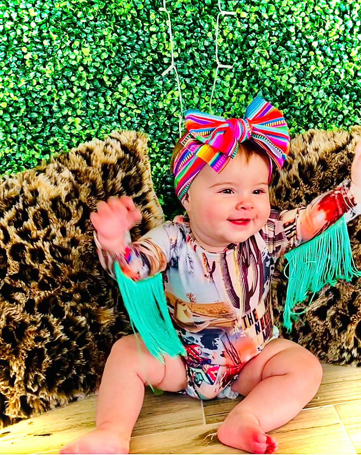 Oakleigh is registered to the contest to win money with this photo: baby_toddler_clothing, cap, child, costume, costume_hat, event, fashion_accessory, fun, grass, green, happy, headwear, joy, leisure, magenta, pattern, people_in_nature, person, pink, play