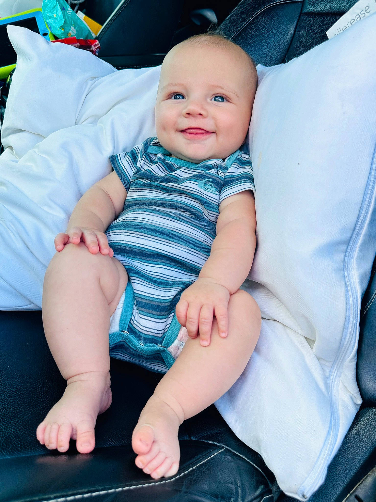 Lennox joined the competition — help win amazing prizes! baby, baby_toddler_clothing, barefoot, cheek, child, comfort, electric_blue, eye, finger, foot, happy, human_leg, joy, lap, leg, person, sitting, skin, smile, sock