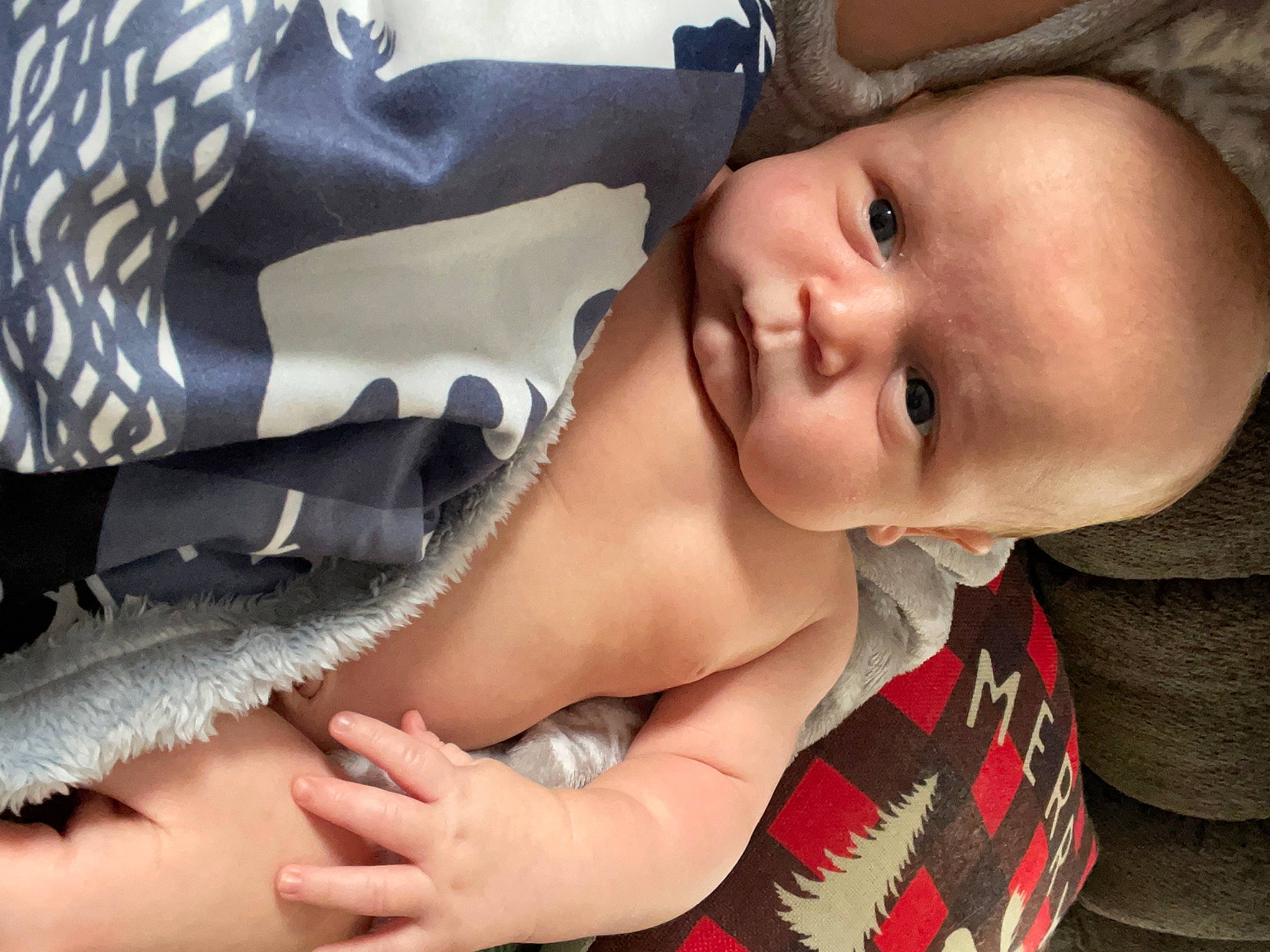 Camden is registered to the contest to win money with this photo: baby, baby_toddler_clothing, cheek, child, comfort, eye, eyelash, fashion_accessory, finger, gesture, hand, happy, hat, lip, mouth, nail, nose, person, skin, smile