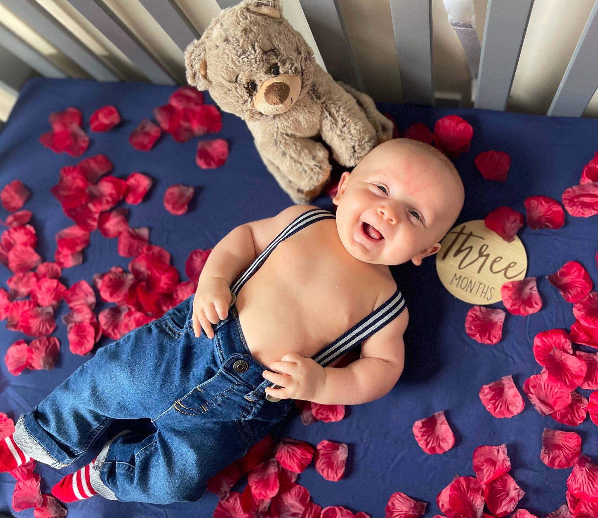 Camden is registered to the contest to win money with this photo: baby, baby_toddler_clothing, carmine, chest, child, comfort, event, fun, happy, linens, mouth, muscle, pattern, person, pink, red, room, smile, stuffed_toy, textile