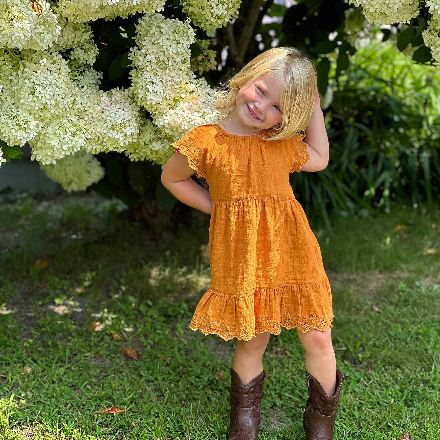 Adilynn joined the competition — help win amazing prizes! blonde, boot, child, clothing, dress, face, female, flower, flowerarrangement, footwear, girl, grass, hair, happy, head, person, photography, plant, portrait, smile