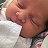 Liam is registered to the contest to win money with this photo: newborn, baby, sleeping, infant, portrait, face, closed_eyes, blanket, swaddled, hospital, bedding, peaceful, cozy, resting, skin, nose, cheeks, close_up, indoor, photography
