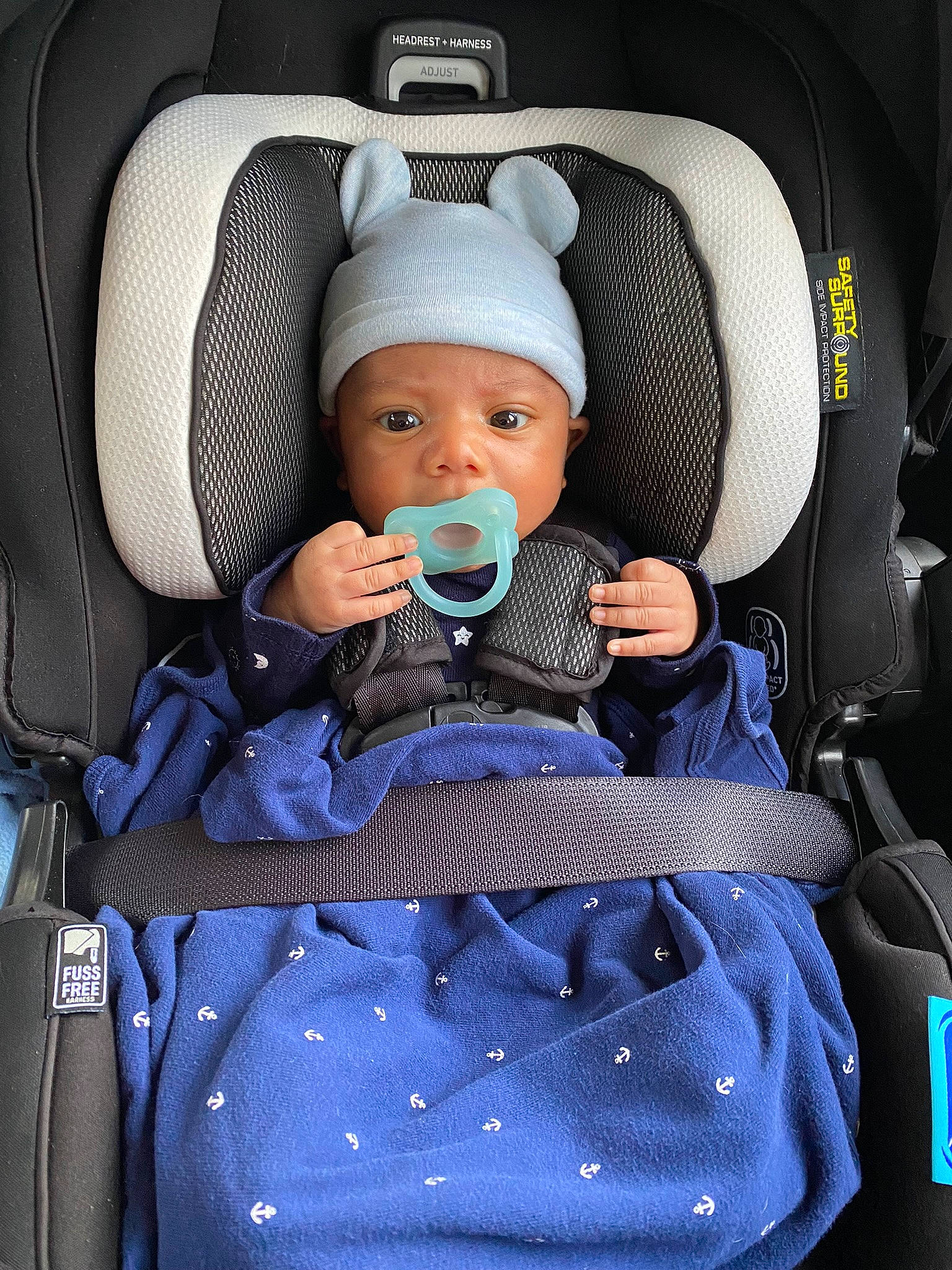 Izaiah is registered to the contest to win money with this photo: auto_part, baby, baby_carriage, baby_products, baby_safety, baby_toddler_clothing, bag, car_seat, car_seat_cover, chair, child, comfort, electric_blue, head_restraint, headwear, pattern, person, product, seat_belt, service