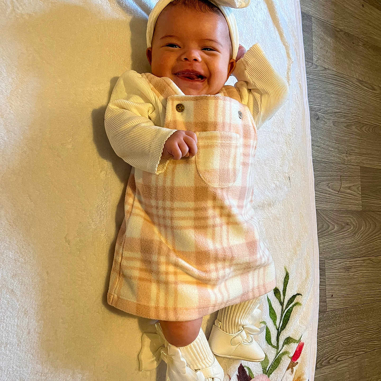 Aria joined the competition — help win amazing prizes! baby, babylaughing, bed, clothing, coat, dress, face, footwear, furniture, happy, hat, head, laughing, newborn, pants, person, photography, portrait, shoe, smile