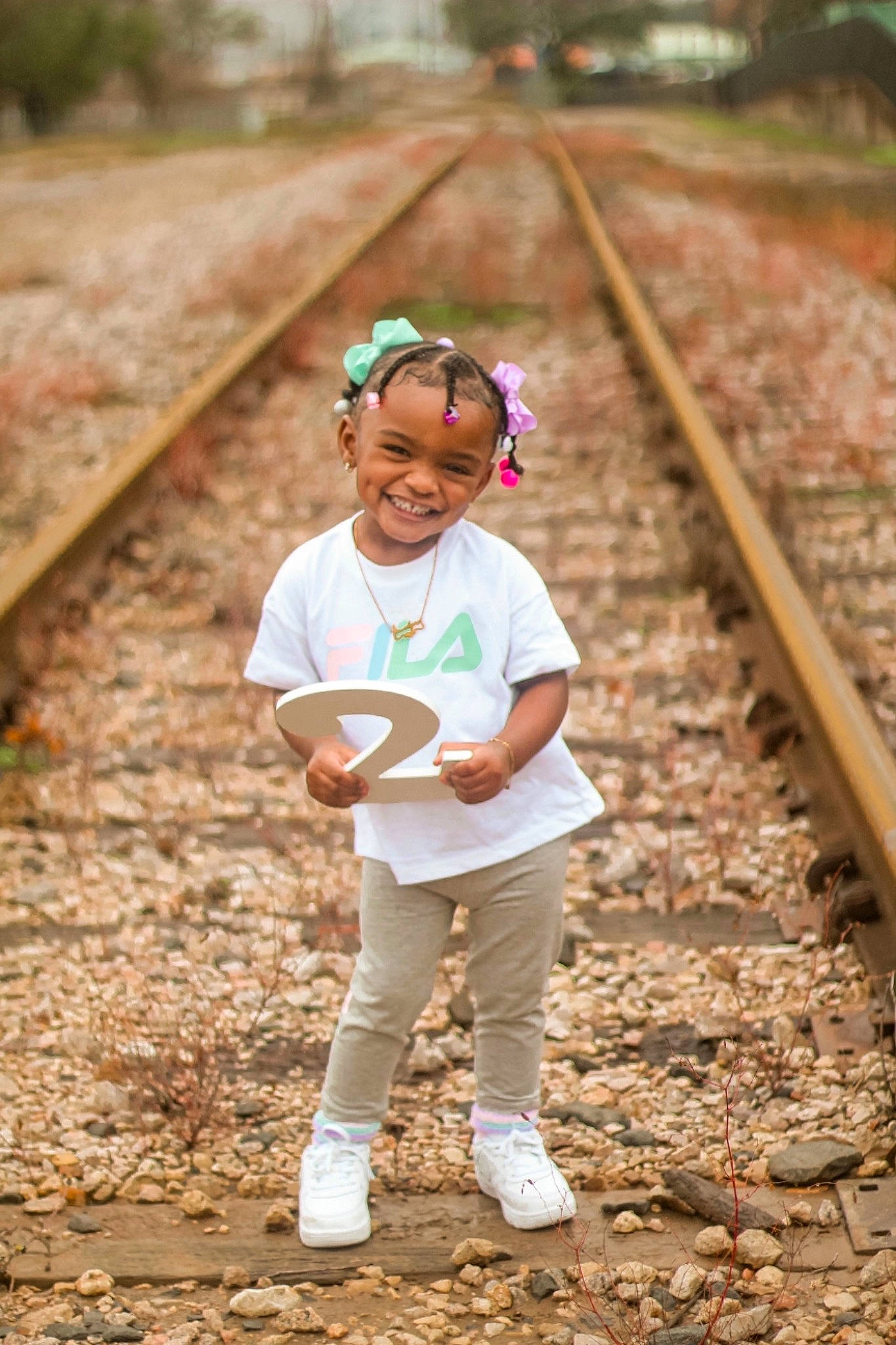 Jacelynn joined the competition — help win amazing prizes! adaptation, botany, eye, footwear, fun, grass, happy, hat, headwear, joy, leisure, nature, people, people_in_nature, person, plant, smile, sneakers, toddler, track