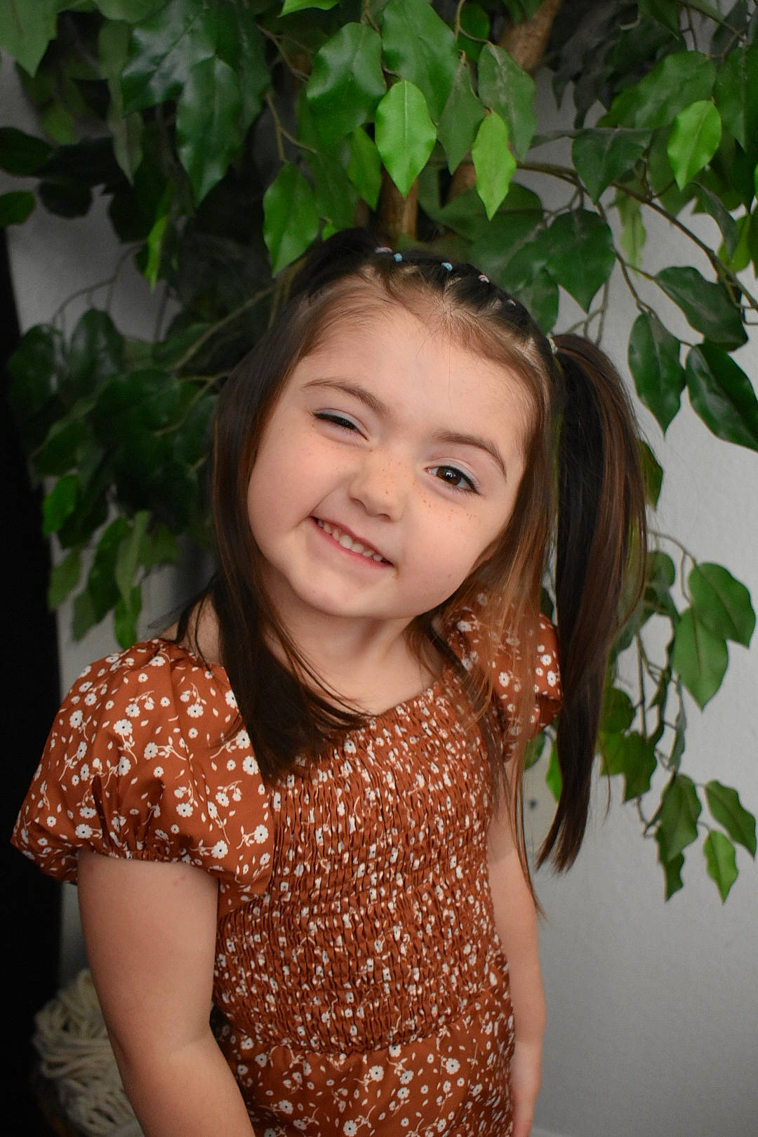 Allie is registered to the contest to win money with this photo: brown_hair, child, eyebrow, facial_expression, flash_photography, fun, grass, hair, happy, iris, joy, lip, long_hair, pattern, people_in_nature, person, plant, skin, sleeve, smile