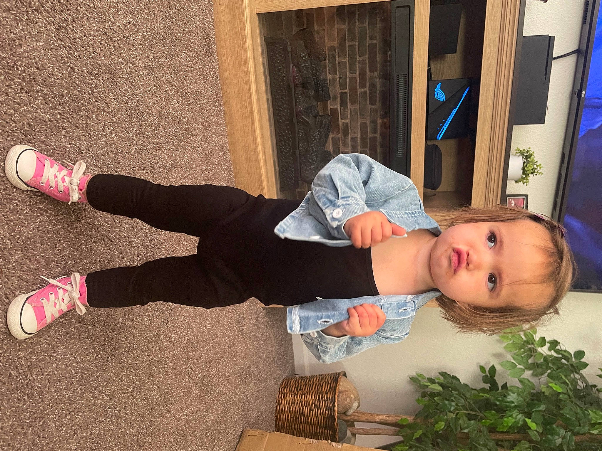 Chloe is registered to the contest to win money with this photo: child, denim, flooring, fun, grass, hat, human_body, human_leg, knee, leg, leisure, pattern, person, plant, shoe, sitting, sock, thigh, toddler, walking_shoe