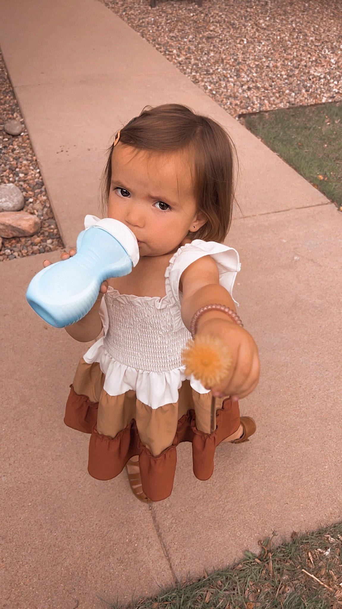 Chloe is registered to the contest to win money with this photo: baby, baby_toddler_clothing, child, finger, foot, fun, gesture, happy, human_leg, joint, nail, peach, person, pink, skin, thigh, thumb, toddler, toy, waist