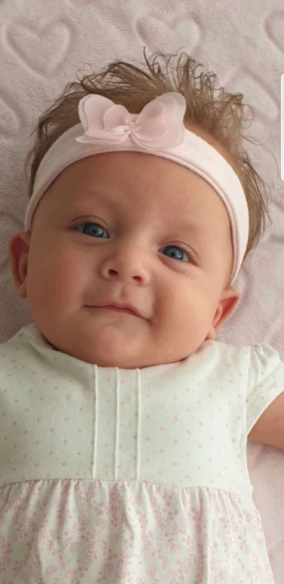 Connie joined the competition — help win amazing prizes! baby, baby_making_funny_faces, cheek, child, chin, ear, face, fashion_accessory, forehead, hair_accessory, head, headband, headgear, lip, mouth, nose, person, pink, skin, smile