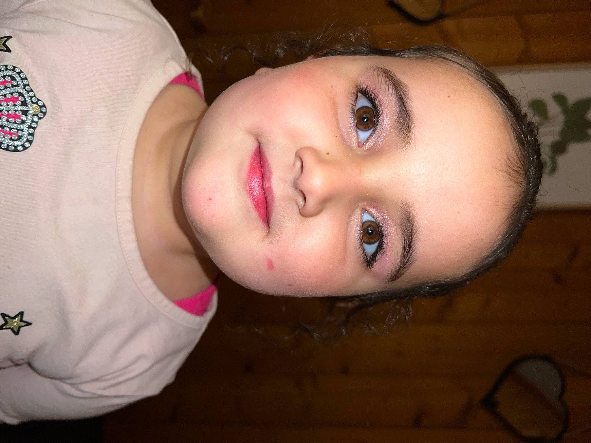 Sophia is registered to the contest to win money with this photo: baby, baby_toddler_clothing, black_hair, cheek, chin, eye, eyebrow, eyelash, flash_photography, forehead, iris, jaw, joy, lip, mouth, neck, nose, person, skin, sleeve