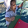 Maé participe au concours pour gagner de l'argent avec cette photo : toddler, child, hat, playground, outdoor, sunlight, shadow, happy, smiling, play, summer, shirt, white_clothing, hand, face, joy, daylight, park, recreation, fun