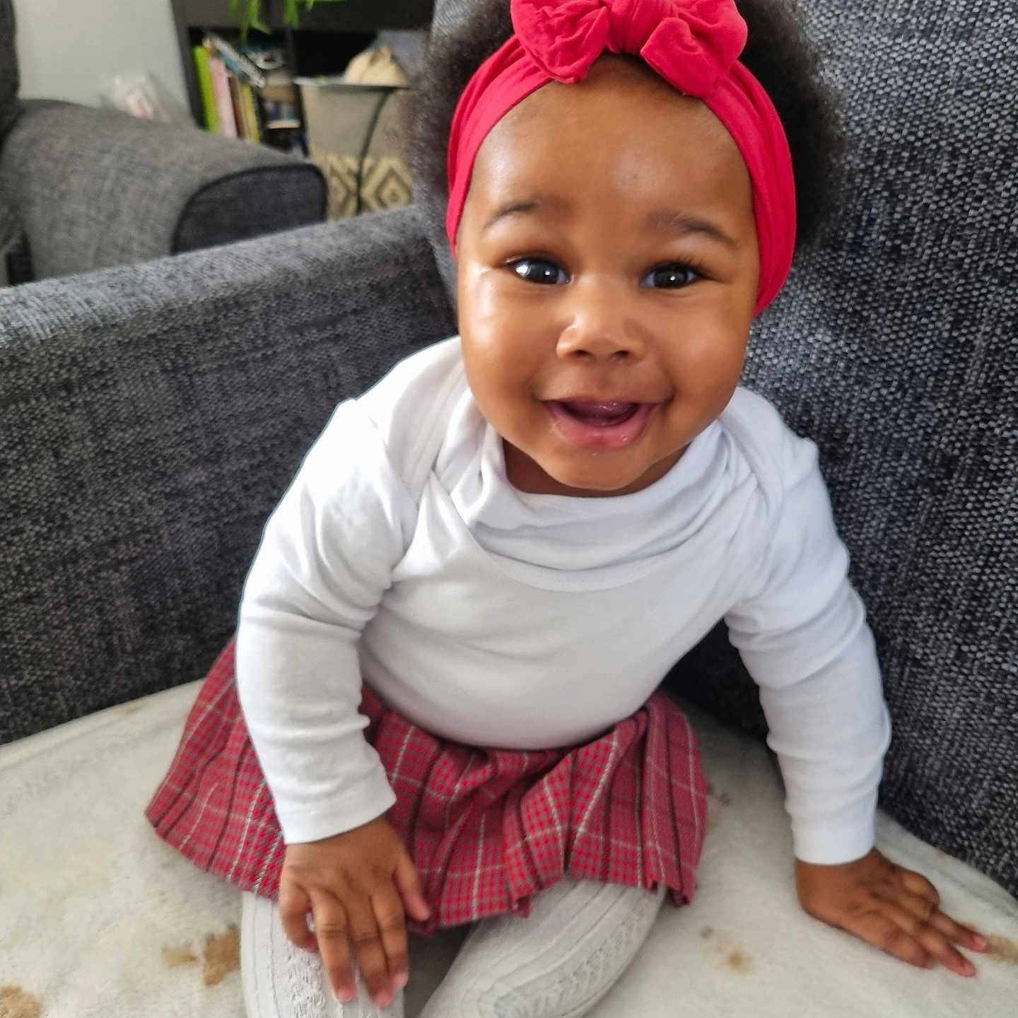 Irah-Rose is registered to the contest to win money with this photo: accessories, architecture, baby, building, couch, cushion, face, furniture, happy, head, homedecor, indoors, livingroom, person, photography, plant, portrait, pottedplant, room, sitting