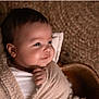 baby, child, face, smile, blanket, wrapped, infant, cute, portrait, indoors, skin, head, hand, newborn, cozy, basket, warm, soft, expression, young
