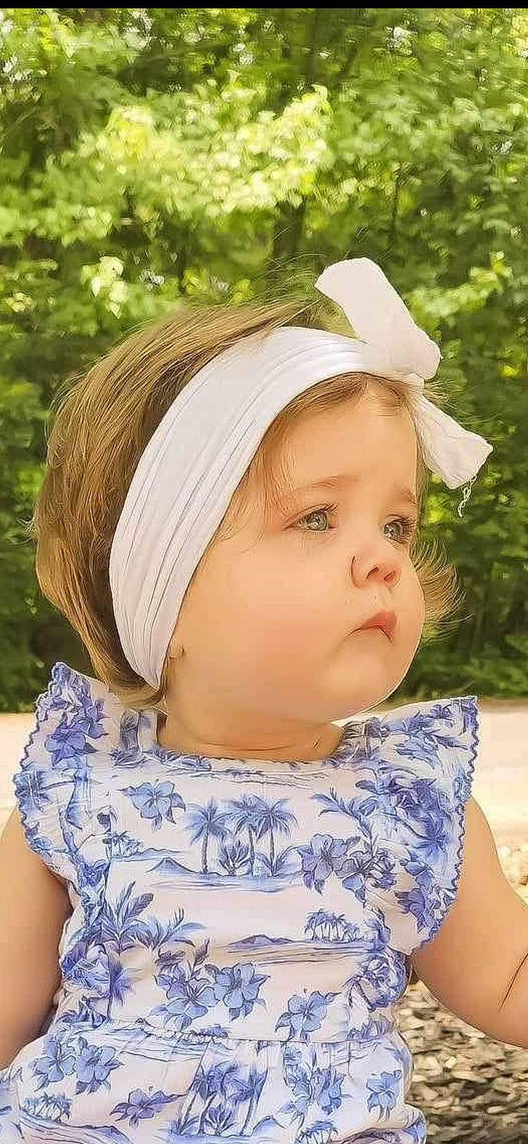 Olivia joined the competition — help win amazing prizes! baby, baby_toddler_clothing, beauty, cheek, child, chin, electric_blue, eye, eyelash, fashion_accessory, grass, hair_accessory, happy, head, headgear, headwear, lip, neck, person, sleeve