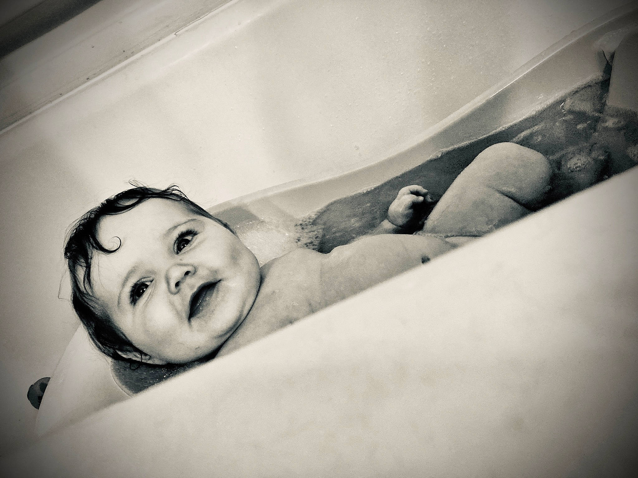 Olivia is registered to the contest to win money with this photo: black_and_white, chest, cloud, comfort, couch, elbow, eyelash, flash_photography, gesture, hair, happy, human_leg, lip, monochrome, monochrome_photography, person, room, smile, stock_photography, style