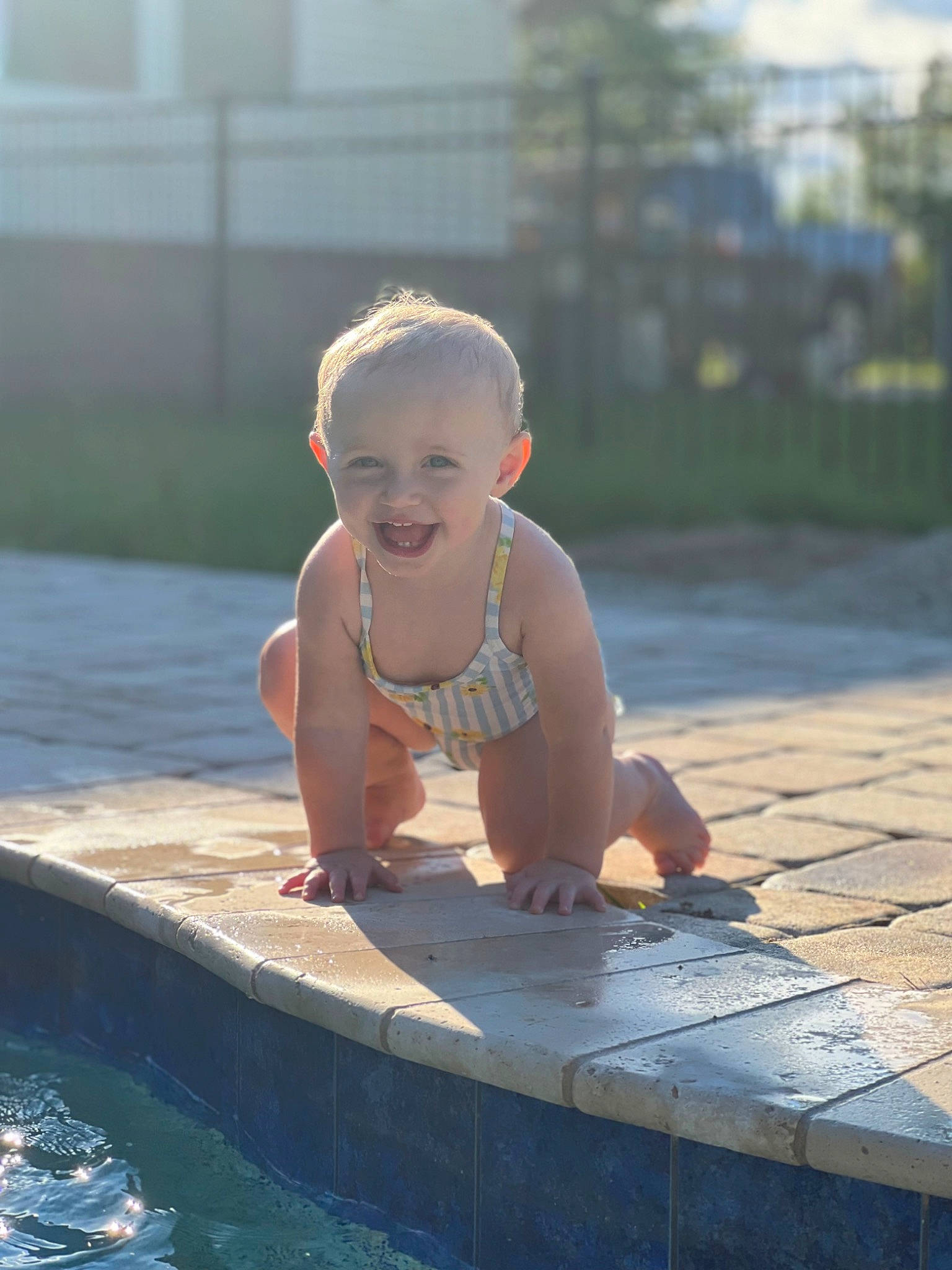 Austyn joined the competition — help win amazing prizes! baby, baby_toddler_clothing, barefoot, child, flooring, foot, fun, goggles, grass, happy, head, joy, leisure, person, plant, recreation, sitting, smile, toddler, vacation