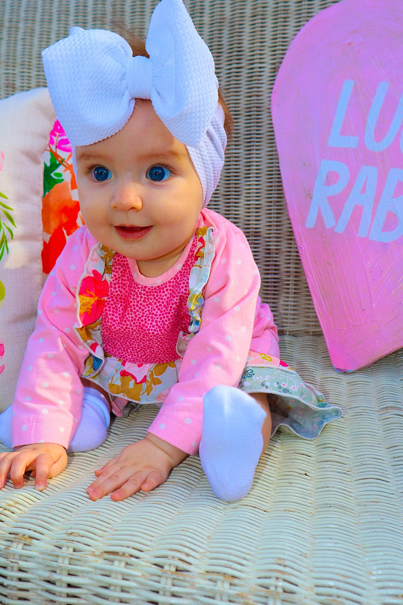 Kaley is registered to the contest to win money with this photo: baby, baby_toddler_clothing, child, headgear, headwear, person, pink, play, toddler