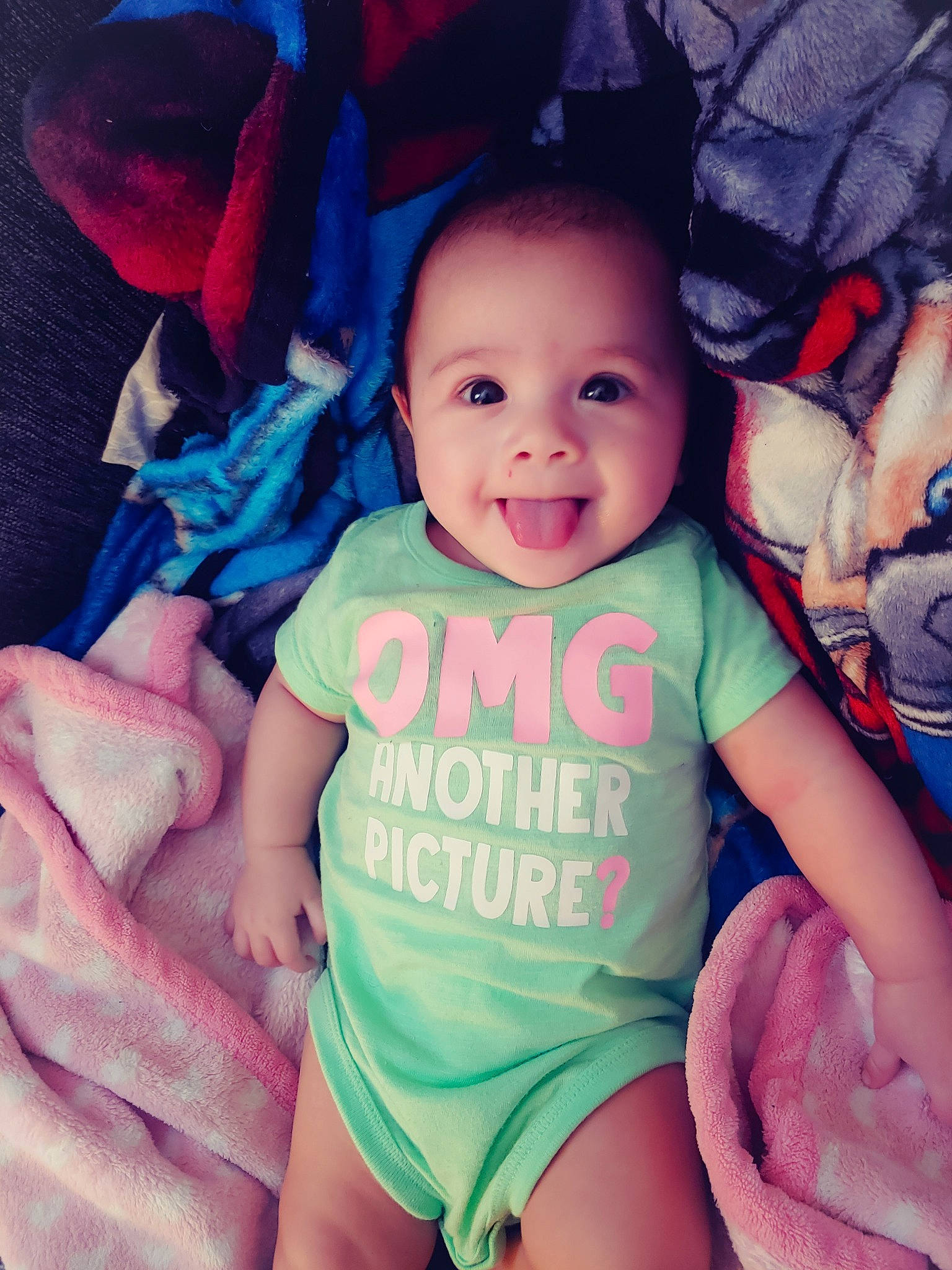 Aleida is registered to the contest to win money with this photo: active_tank, baby, baby_bloomers, baby_laughing, baby_products, baby_toddler_clothing, cheek, child, comfort, cool, joy, laugh, nightwear, person, pink, product, sock, toddler, tooth