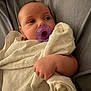Arrow is registered to the contest to win money with this photo: baby, biting, blanket, bodypart, face, finger, hand, head, newborn, person, photography, portrait, quilt, towel, yawning