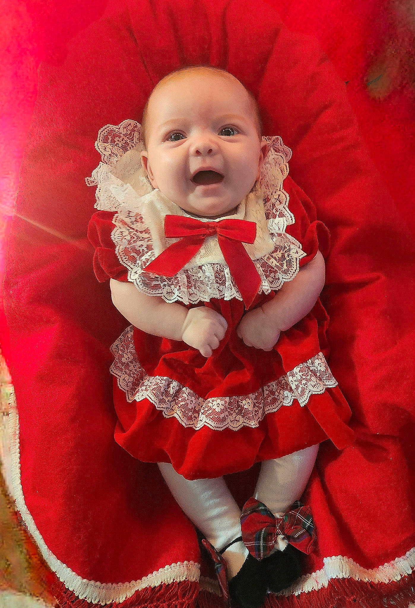 Karsyn is registered to the contest to win money with this photo: baby, baby_toddler_clothing, cheek, day_dress, dress, embellishment, flash_photography, happy, iris, lip, magenta, pattern, person, pink, ruffle, skin, sleeve, sock, standing, textile