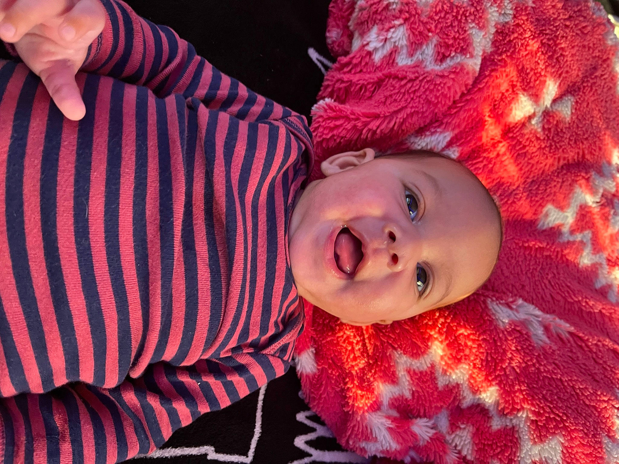 Jonah is registered to the contest to win money with this photo: baby, baby_toddler_clothing, cheek, child, electric_blue, event, eye, face, facial_expression, fun, happy, hat, head, magenta, pattern, people, person, skin, sleeve, smile