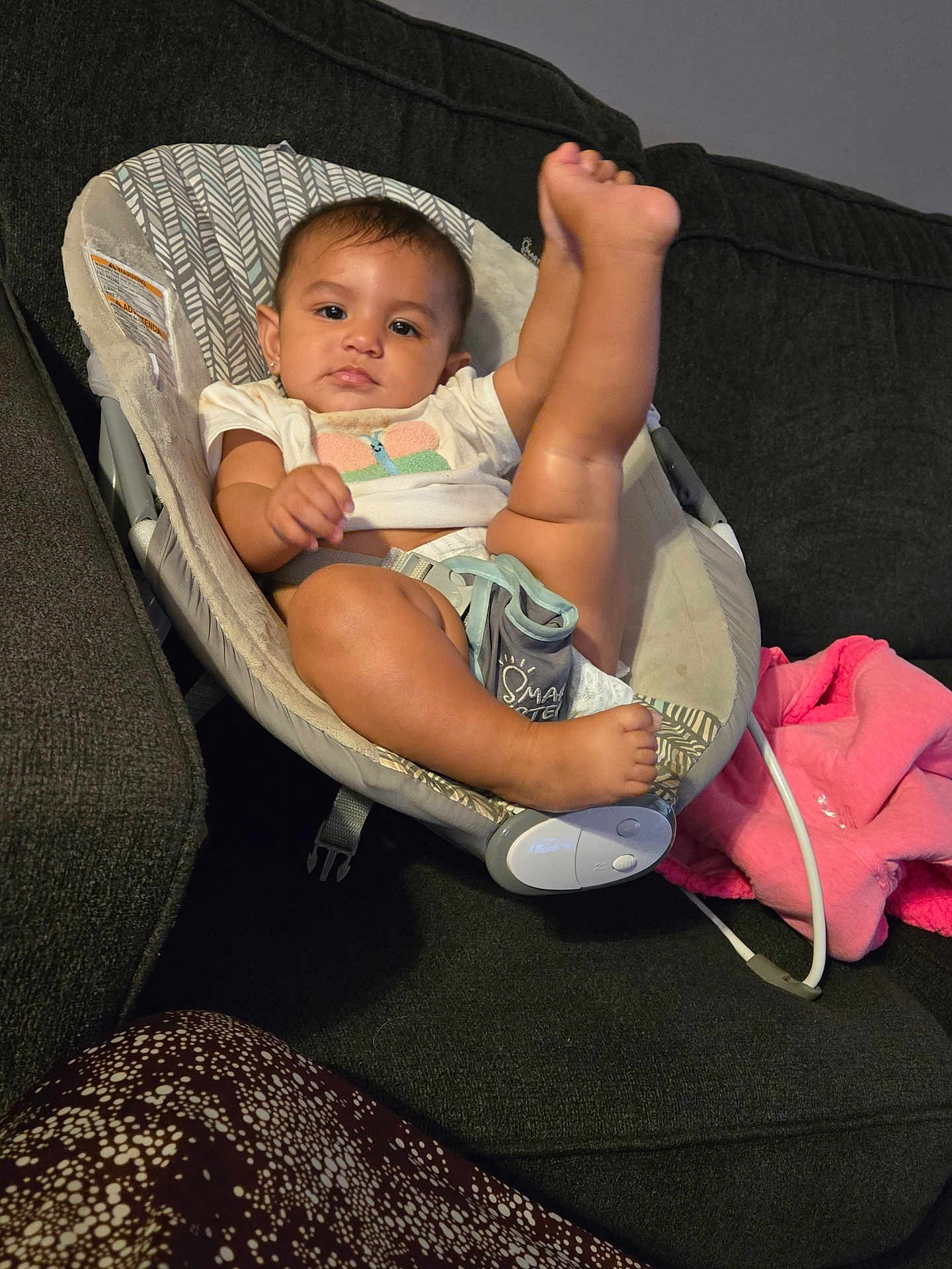 Adaline joined the competition — help win amazing prizes! baby, infant, baby_seat, couch, sofa, blanket, clothing, foot, leg, face, person, indoor, child, relaxing, comfortable, curious, seatbelt, fabric, home, cute