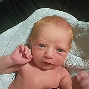 Owen joined the competition — help win amazing prizes! baby, newborn, infant, towel, skin, hand, face, eyes, portrait, cute, child, person, lying_down, expression, soft, blanket, young, human, resting, indoors