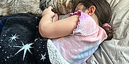 Rolo joined the competition — help win amazing prizes! child, cat, bed, blanket, sleeping, indoor, cozy, tabby_cat, person, pajamas, furniture, relaxing, cute, hair, comfort, nap, together, rest, soft, sleep