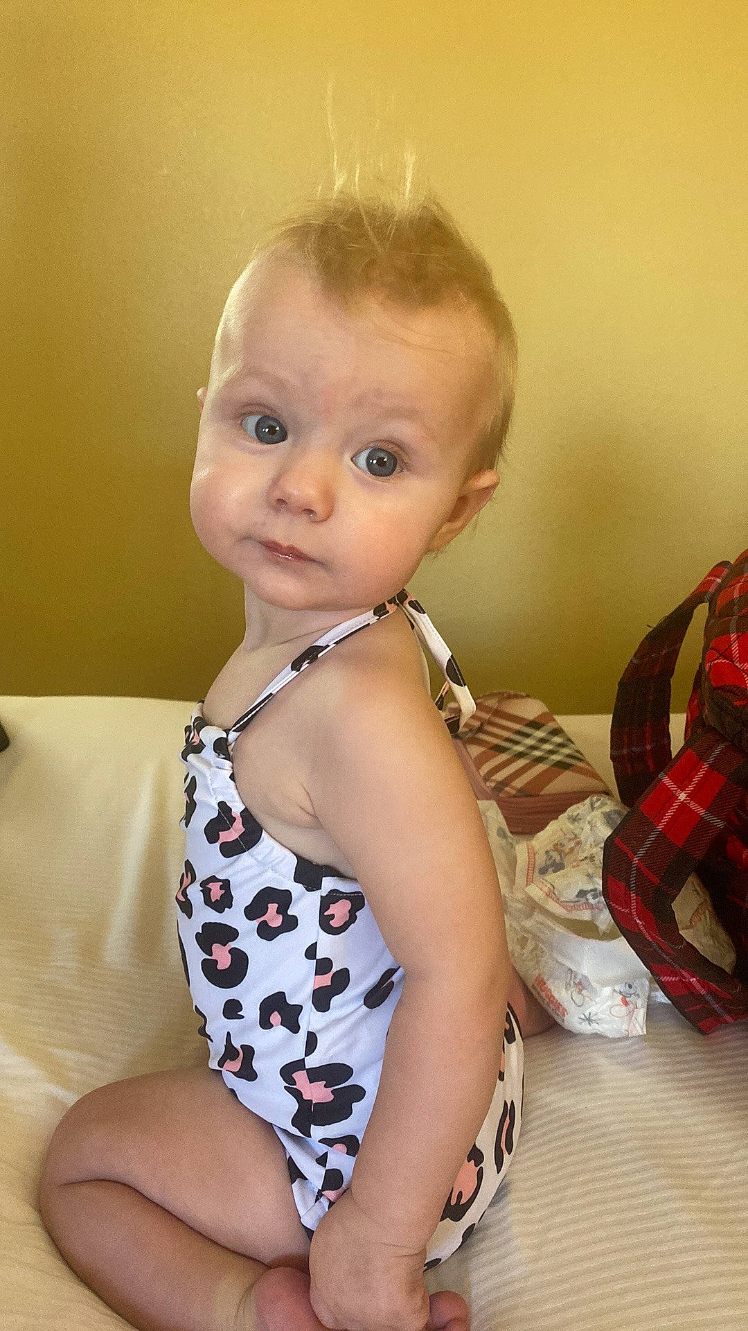 Landry is registered to the contest to win money with this photo: arm, baby, baby_toddler_clothing, cheek, chest, chin, eye, eyelash, head, human_body, iris, joint, lip, neck, nose, person, shoulder, skin, sleeve, tartan