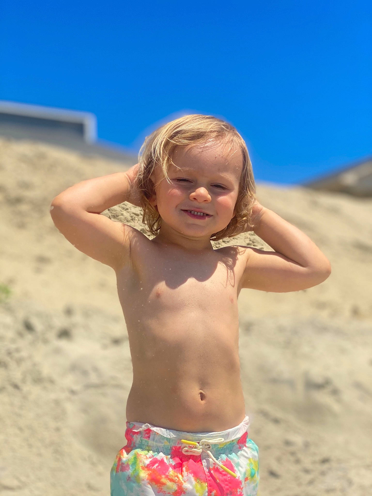 Camdyn is registered to the contest to win money with this photo: arm, barechested, body_of_water, eye, face, hair, happy, head, human_body, joy, neck, people_in_nature, people_on_beach, person, skin, sky, smile, stomach, swimwear, travel