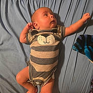 Luke joined the competition — help win amazing prizes! baby, bear_face, bed, blanket, blue_sheet, curious, cute, foot, hand, indoors, infant, lying_down, newborn, onesie, person, portrait, raised_arm, skin, sleepwear, striped_clothing