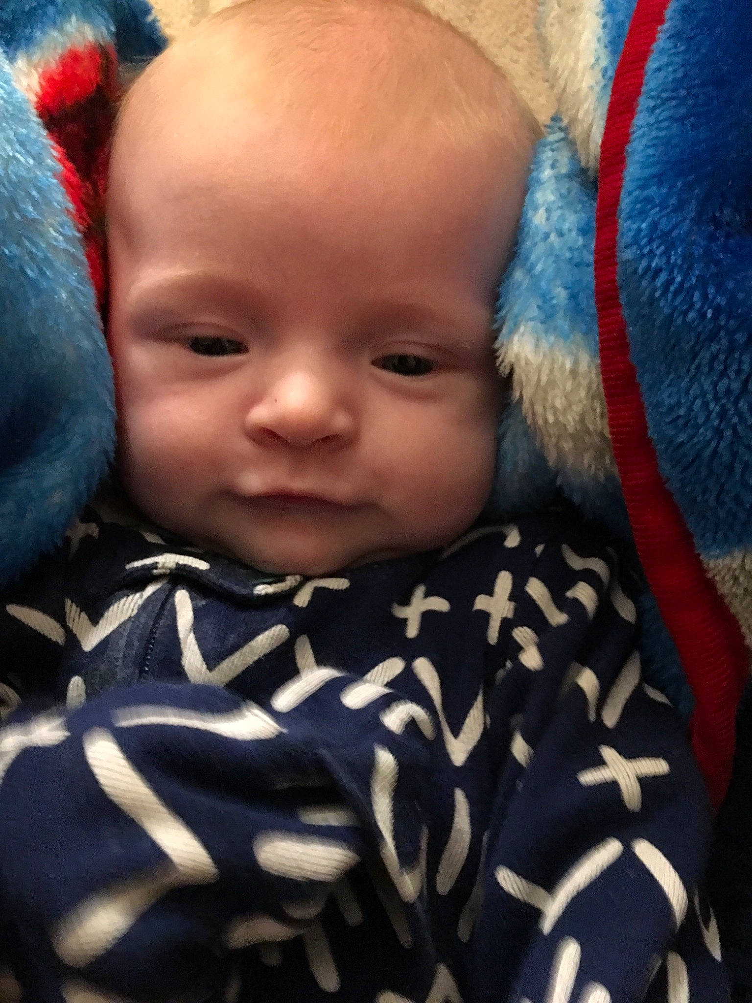 Declan is registered to the contest to win money with this photo: baby, blue, cheek, child, close_up, ear, eye, eyebrow, face, forehead, head, iris, lip, mouth, nose, person, skin, smile, toddler