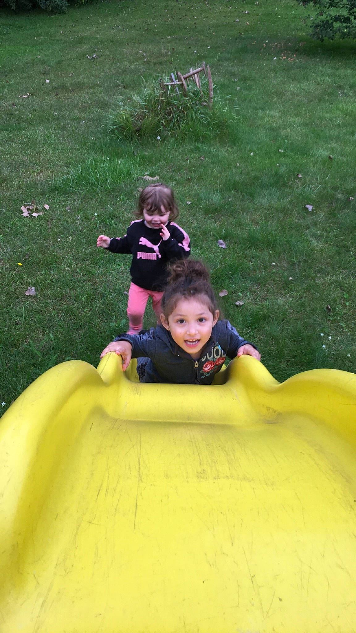 Kailiannah joined the competition — help win amazing prizes! child, fun, grass, joy, leisure, outdoor_play_equipment, person, play, playground, public_space, recreation, toddler, yellow
