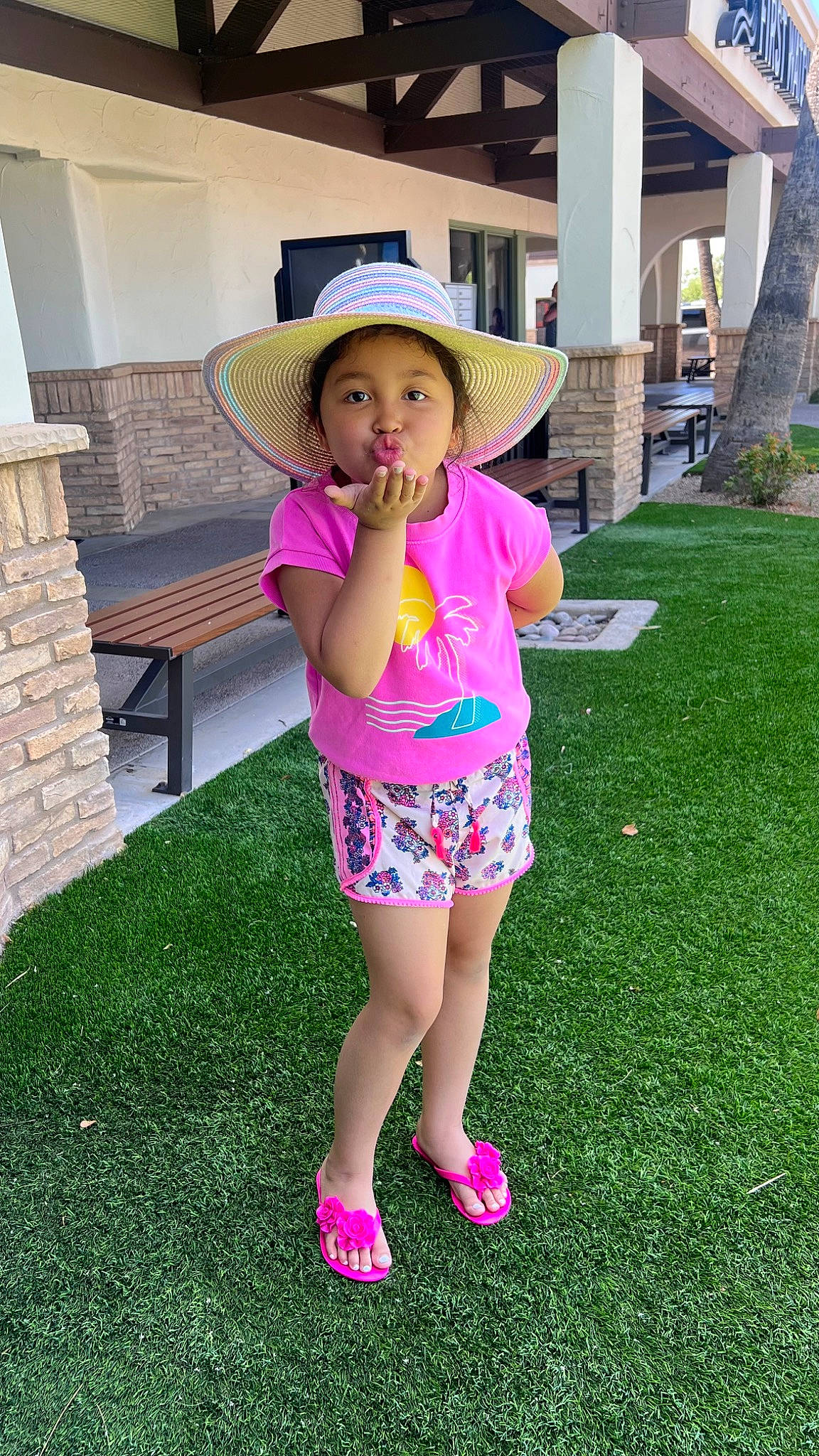 Noella joined the competition — help win amazing prizes! cowboy_hat, fashion_accessory, fun, garden, grass, happy, hat, human_leg, lawn, leisure, magenta, pattern, person, pink, plant, recreation, sandal, sun_hat, thigh, toddler