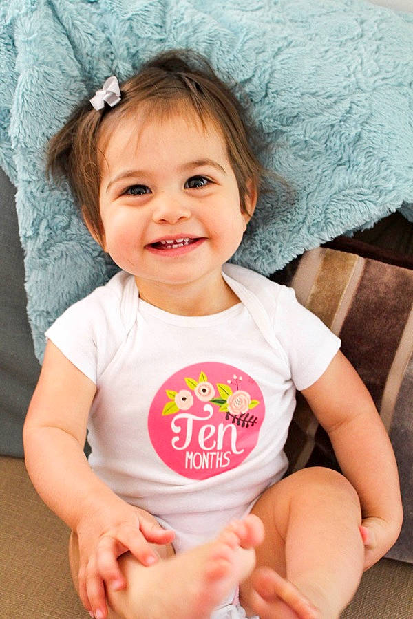Sydney Nevaeh is registered to the contest to win money with this photo: baby, baby_products, baby_toddler_clothing, cheek, child, child_model, headgear, joy, person, pink, play, product, sitting, skin, sleeve, smile, toddler