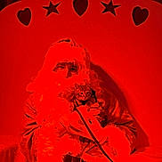 Apollon a rejoint le concours — aidez-le/la à gagner de superbes lots ! beard, cat, costume, decor, festive, fur_trim, glasses, gloves, heart_shape, holiday, indoor, kitten, leash, person, portrait, red_lighting, santa_claus, seated, star_shape, warm_tone