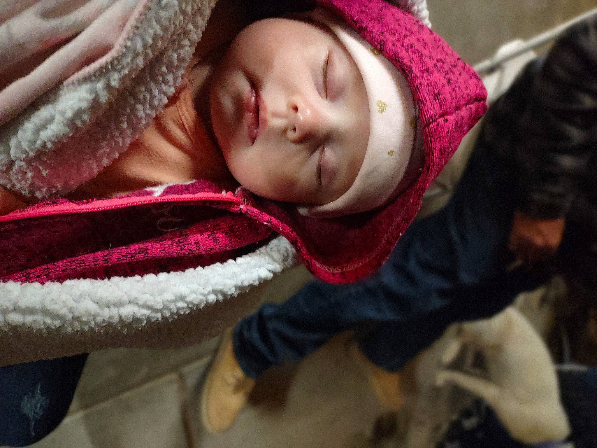 Rosemary is registered to the contest to win money with this photo: baby, cheek, child, comfort, facial_expression, headgear, headwear, linens, lip, magenta, mouth, nose, person, pink, purple, red, skin, textile, toddler, white