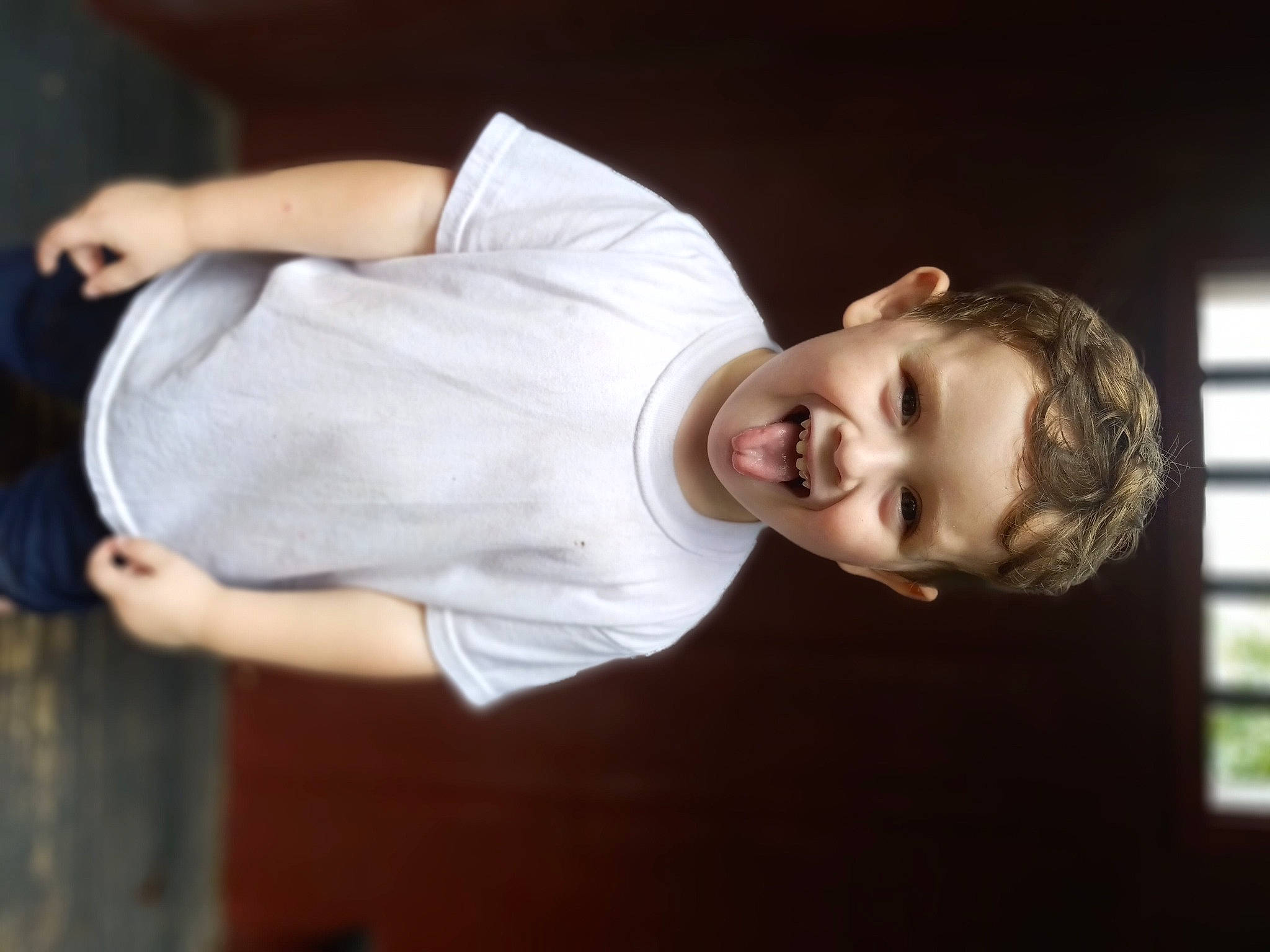 Reese joined the competition — help win amazing prizes! child, elbow, entertainment, event, flash_photography, fun, gesture, happy, person, room, sleeve, smile, t_shirt, window, wrist