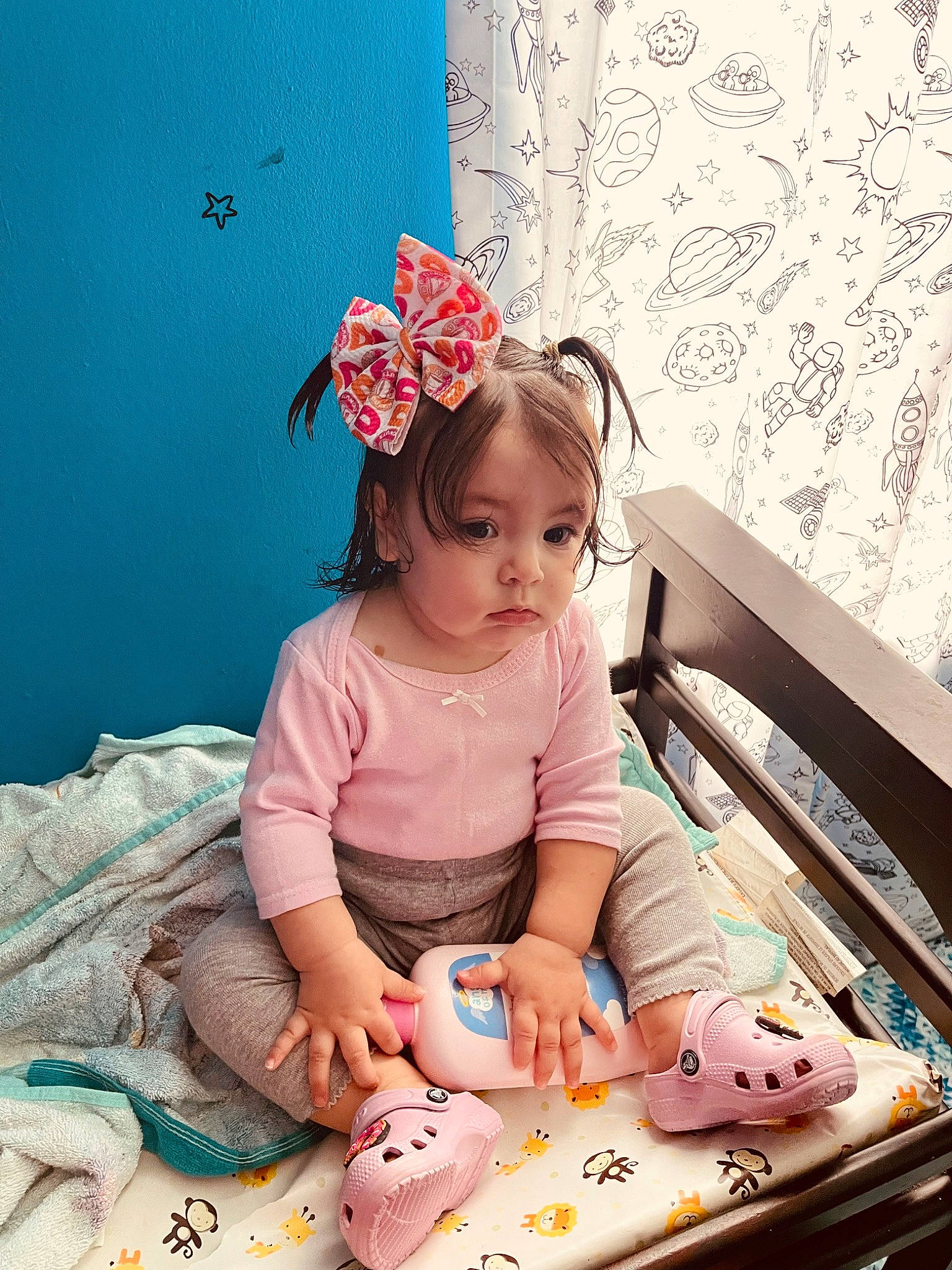 Anni is registered to the contest to win money with this photo: arm, baby, baby_products, baby_toddler_clothing, beauty, child, dress, finger, hairstyle, hand, happy, leg, magenta, pattern, person, pink, sitting, skin, sleeve, textile