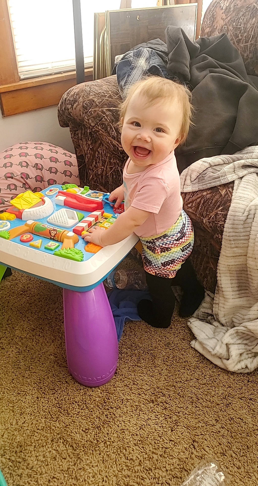 Echo joined the competition — help win amazing prizes! baby, baby_playing_with_toys, baby_toddler_clothing, beauty, child, comfort, couch, face, floor, flooring, fun, furniture, happy, leisure, living_room, person, sitting, smile, table, toddler
