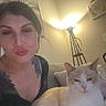 Blanco joined the competition — help win amazing prizes! woman, cat, indoor, lamp, couch, wall_art, portrait, relaxed, cozy, furniture, pet, casual, home, person, animal, light, sitting, cute, feline, living_room