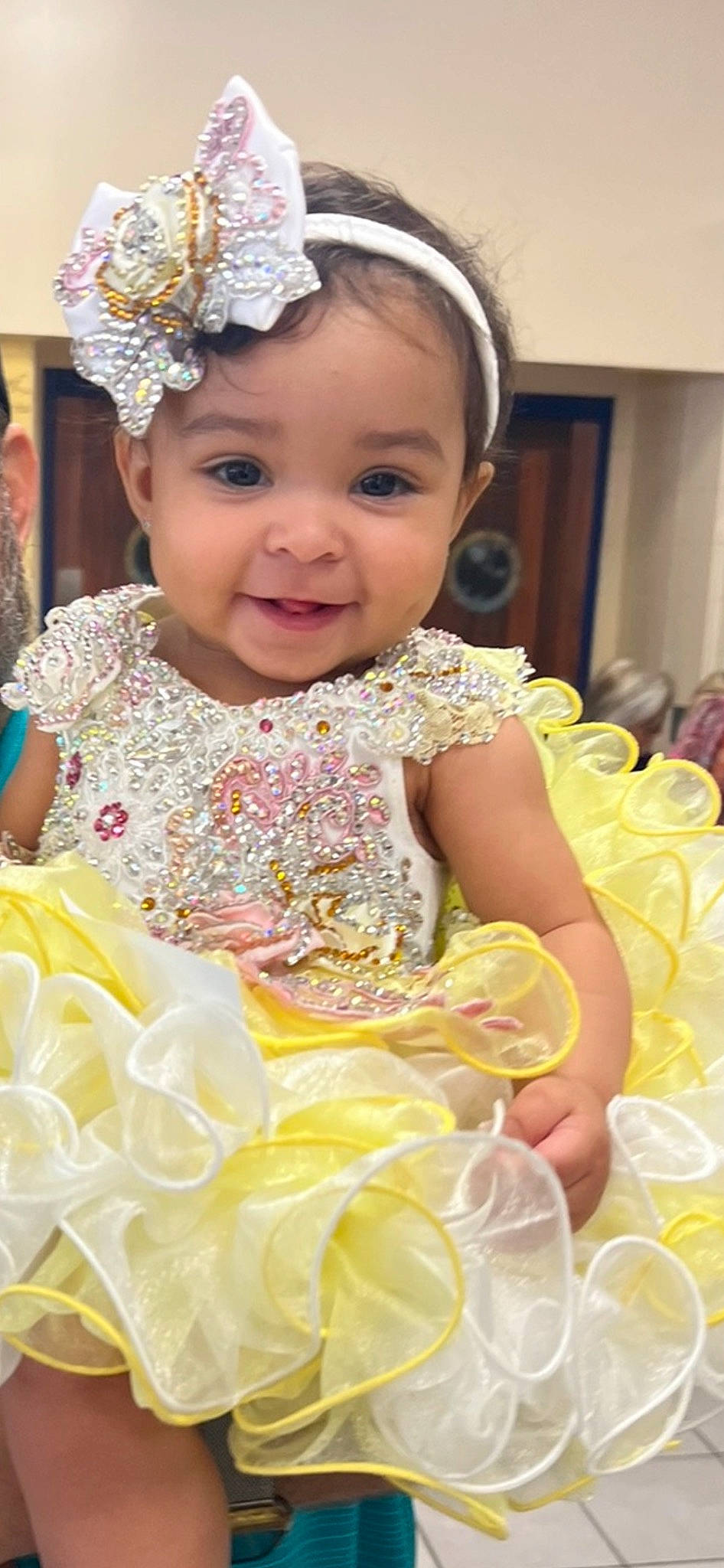 Alora joined the competition — help win amazing prizes! baby, baby_toddler_clothing, beauty, child, clothing, embellishment, event, facial_expression, fun, happy, headgear, headpiece, headwear, iris, joy, person, petal, pink, skin, smile