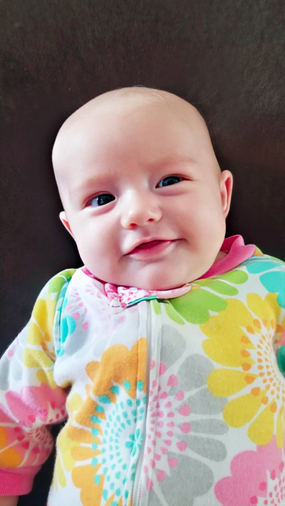 Emmalyn is registered to the contest to win money with this photo: baby, baby_toddler_clothing, cheek, child, eye, face, head, joy, lip, mouth, person, pink, skin, smile, textile, toddler
